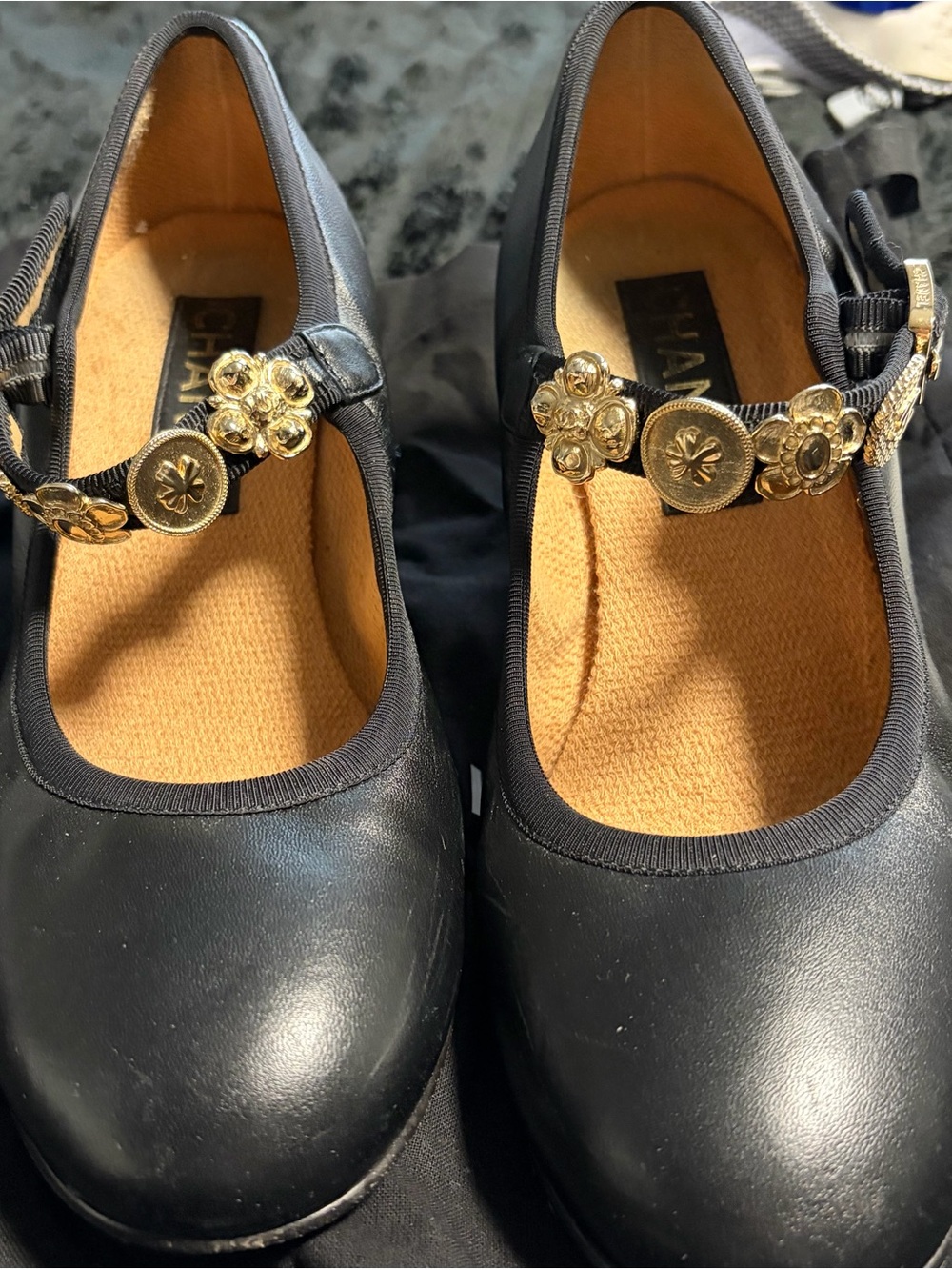CHANEL Black Leather Mary Jane Flats with Gold Flower Chain